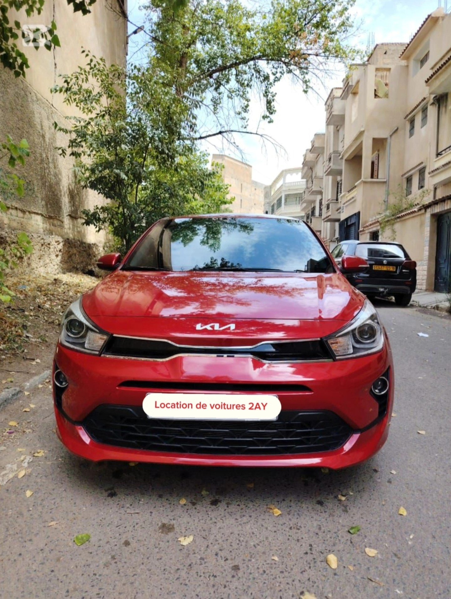 Kia Rio 9 Kia Rio rouge en location voitures Sétif chez 2AY